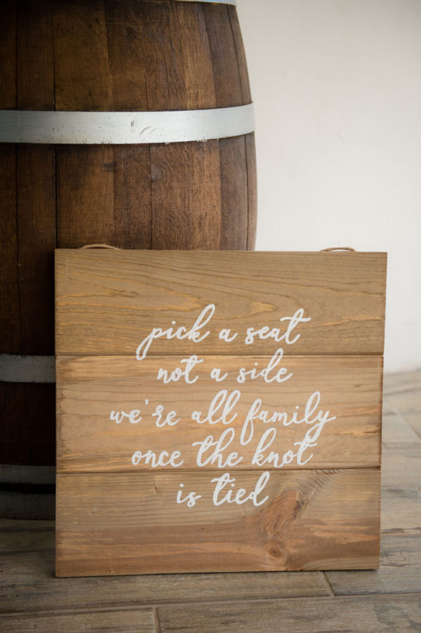 Pick a Seat Not a Side Rustic Wood Sign in the Something Borrowed Wedding Closet | 48 Fields Farm in Leesburg, VA