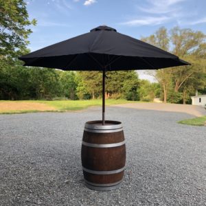 Wine Barrel with Black Patio Umbrella in the Something Borrowed Wedding Closet | 48 Fields Farm in Leesburg, VA