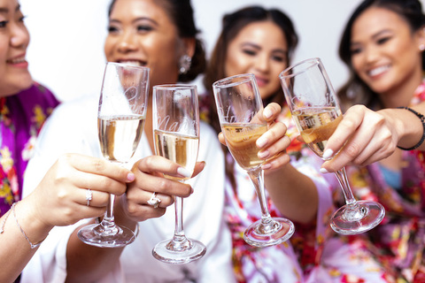 bride and bridesmaids toast with personalized champagne glasses - 48 Fields Wedding Barn | Northern VA