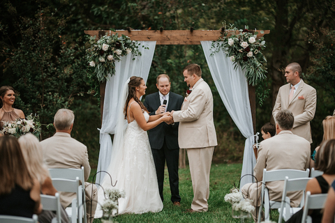 fall outdoor ceremony arbor white fabric and flowers - 48 Fields Wedding Barn | Leesburg VA
