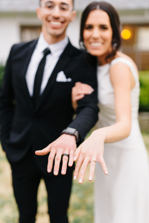 bride and groom showing off rings - 48 Fields Wedding Barn | Leesburg VA