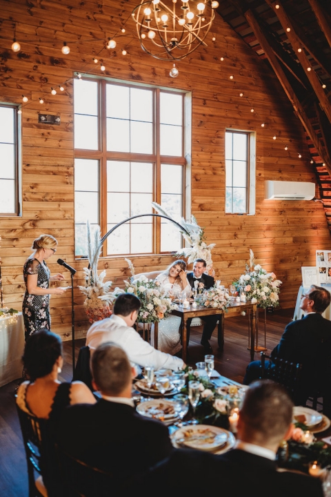 toasts bride and groom sweetheart table pampas grass boho wedding - 48 Fields Wedding Barn | Leesburg VA