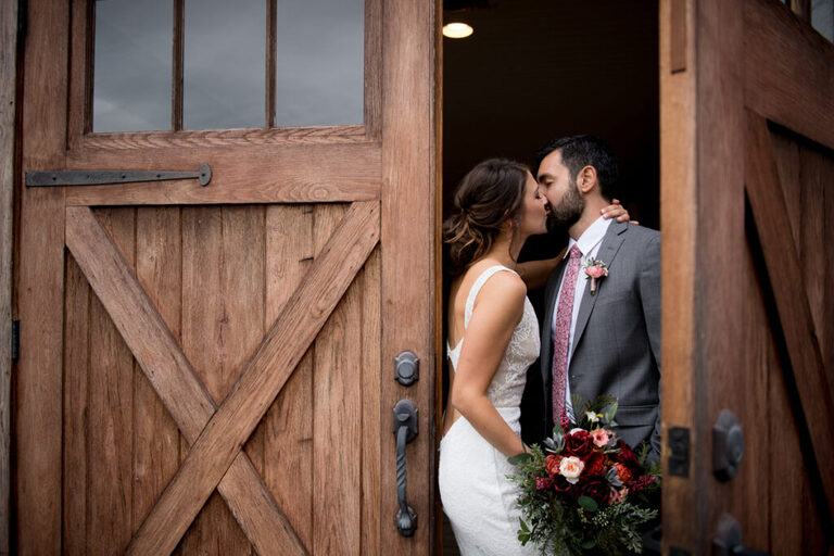 Wedding portrait at barn doors